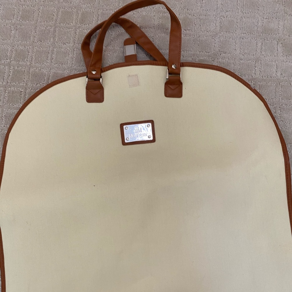 Garment bed, color tan and camel. Never used!